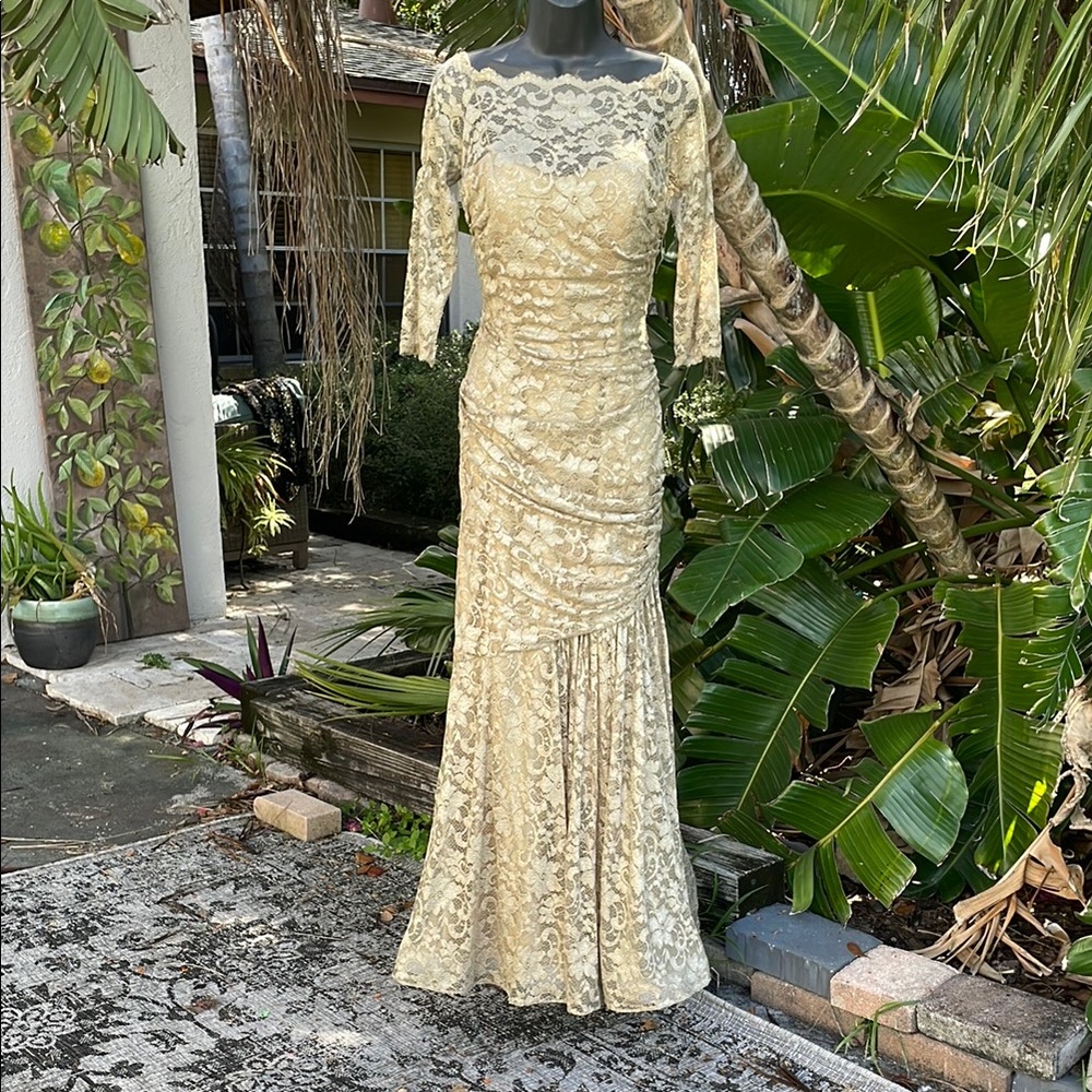 Lace metallic gold, champagne, and silver off the shoulder trumpet gown